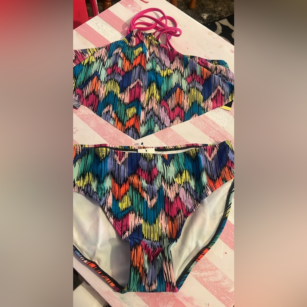New 2pc swimsuit. Girls XXL(18)